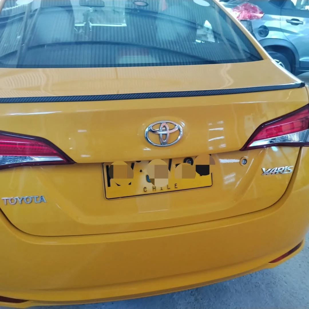 Resultado final del sector trasero de un Toyota Yaris amarillo